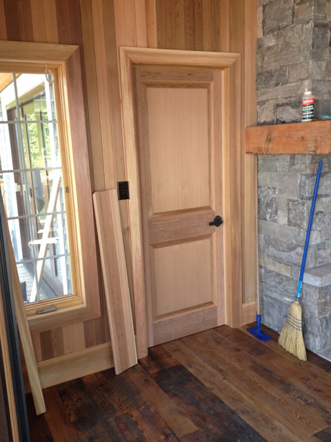 Log Cabins and Homes Interior of log cabin featuring exposed wood beams and vaulted ceiling