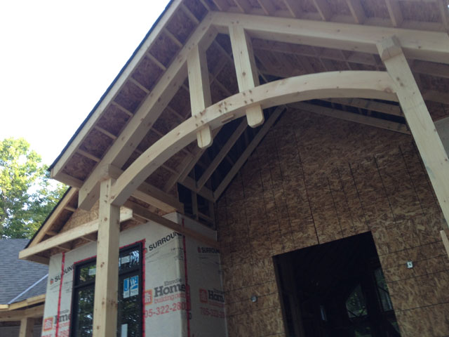 Timber Frames Exposed beam timber frame ceiling inside custom home